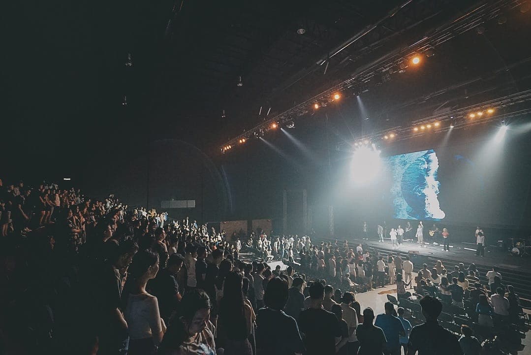 The Collective community worshipping together